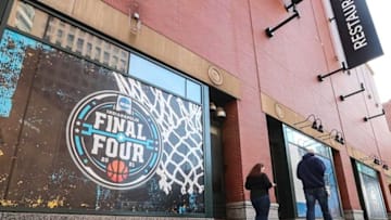 March Madness and Final Four signage goes up around downtown Indianapolis on Monday March 8, 2021, in preparation for the NCAA tournament.Finals 7