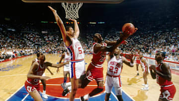 Chicago Bulls guard Michael Jordan (23) is defended by Detroit Pistons center James Edwards Credit: MPS-USA TODAY Sports