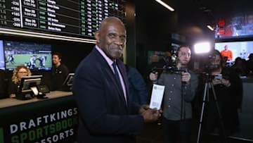 ATLANTIC CITY, NJ - NOVEMBER 20: Harry Carson NFL Hall of Famer places the first bet at the Grand Opening of DraftKings Sportsbook at Resorts November 20, 2018 at Resorts Casino Hotel in Atlantic City, New Jersey. (Photo by Bill McCay/Getty Images for Draft Kings)