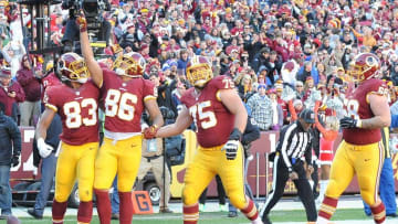 Dec 20, 2015; Landover, MD, USA; Washington Redskins tight end Jordan Reed (86) celebrates with tight end Alex Smith (83) after scoring a touchdown against the Buffalo Bills during the first half at FedEx Field. Mandatory Credit: Brad Mills-USA TODAY Sports