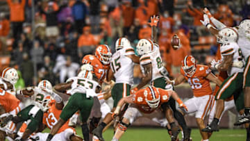 Miami defenders block a field goal attempt by Clemson kicker B.T. Potter.Ncaa Football Miami At Clemson