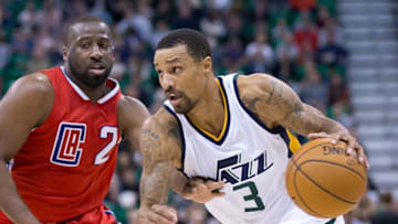 Oct 17, 2016; Salt Lake City, UT, USA; Utah Jazz guard George Hill (3) dribbles the ball as Los Angeles Clippers guard Raymond Felton (2) defends during the second half at Vivint Smart Home Arena. The Jazz won 104-78. Mandatory Credit: Russ Isabella-USA TODAY Sports