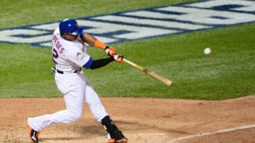 Oct 30, 2015; New York City, NY, USA; New York Mets center fielder Yoenis Cespedes drives in a run with a sacrifice fly against the Kansas City Royals in the 6th inning in game three of the World Series at Citi Field. Mandatory Credit: Jeff Curry-USA TODAY Sports