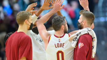 Dec 15, 2021; Cleveland, Ohio, USA; Cleveland Cavaliers forward Kevin Love (0) celebrates his three-point basket in the third quarter against the Houston Rockets at Rocket Mortgage FieldHouse. Mandatory Credit: David Richard-USA TODAY Sports