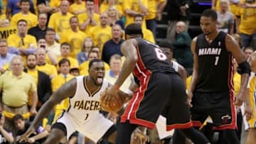 May 28, 2014; Indianapolis, IN, USA; Indiana Pacers guard Lance Stephenson (1) guards Miami Heat forward LeBron James (6) during the fourth quarter in game five of the Eastern Conference Finals of the 2014 NBA Playoffs at Bankers Life Fieldhouse. Indiana defeats Miami 93-90. Mandatory Credit: Brian Spurlock-USA TODAY Sports