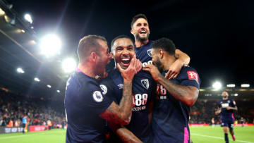 SOUTHAMPTON, ENGLAND - SEPTEMBER 20: Callum Wilson of AFC Bournemouth celebrates after scoring his team's third goal with Steve Cook and Joshua King of AFC Bournemouth during the Premier League match between Southampton FC and AFC Bournemouth at St Mary's Stadium on September 20, 2019 in Southampton, United Kingdom. (Photo by Alex Pantling/Getty Images)