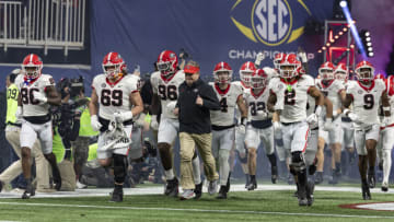 ATLANTA, GEORGIA - DECEMBER 2: Georgia Bulldogs take the field during a game between University of Georgia and University of Alabama at Mercedes-Benz Stadium on December 2, 2023 in Atlanta, Georgia. (Photo by Steve Limentani/ISI Photos/Getty Images)