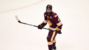 CHICAGO, IL - APRIL 08: Minnesota-Duluth Bulldogs defenseman Neal Pionk (4) controls the puck during the NCAA men's national championship game between the Minnesota-Duluth Bulldogs and the Denver Pioneers on April 8, 2017, at United Center in Chicago, IL. Denver won 3-2. (Photo by Patrick Gorski/Icon Sportswire via Getty Images)