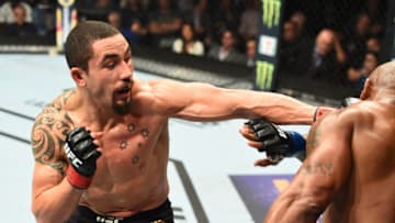 CHICAGO, ILLINOIS - JUNE 09: (L-R) Robert Whittaker of New Zealand punches Yoel Romero of Cuba in their middleweight fight during the UFC 225 event at the United Center on June 9, 2018 in Chicago, Illinois. (Photo by Josh Hedges/Zuffa LLC/Zuffa LLC via Getty Images)
