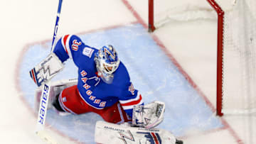 NEW YORK, NY - DECEMBER 02: New York Rangers Goalie Henrik Lundqvist (30) makes a kick save during the National Hockey League game between the Winnipeg Jets and the New York Rangers on December 2, 2018 at Madison Square Garden in New York, NY. (Photo by Joshua Sarner/Icon Sportswire via Getty Images)