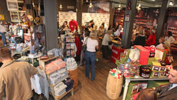 NASHVILLE, TN - NOVEMBER 10: Shoppers look over the Cracker Barrel exclusive Alan Jackson merchandise prior to an Alan Jackson meet & greet at The Cracker Barrel 'Pop Up' Old Country Store on November 10, 2009 in Nashville, Tennessee. (Photo by Frederick Breedon/Getty Images for Cracker Barrel)