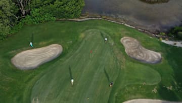 MIAMI, FLORIDA - APRIL 29: In this aerial photo from a drone, golfers enjoy a morning of golfing at the Crandon Golf at Key Biscayne course on April 29, 2020 in Miami, Florida. Miami-Dade county began to slowly reopen Wednesday as restrictions, with some caveats, were dropped for people to use marinas, parks, golf courses, tennis courts and other areas where social distancing remains relatively easy to continue to contain the coronavirus pandemic. (Photo by Joe Raedle/Getty Images)