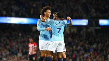 MANCHESTER, ENGLAND - NOVEMBER 04: Leroy Sane of Manchester City celebrates with teammates Phil Foden, and Raheem Sterling after scoring his team's sixth goal during the Premier League match between Manchester City and Southampton FC at Etihad Stadium on November 4, 2018 in Manchester, United Kingdom. (Photo by Clive Brunskill/Getty Images)
