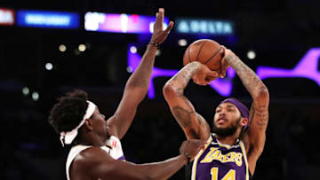 LOS ANGELES, CALIFORNIA - FEBRUARY 27: Brandon Ingram #14 of the Los Angeles Lakers shoots the ball against Jrue Holiday #11 of the New Orleans Pelicans during the second half at Staples Center on February 27, 2019 in Los Angeles, California. NOTE TO USER: User expressly acknowledges and agrees that, by downloading and or using this photograph, User is consenting to the terms and conditions of the Getty Images License Agreement. (Photo by Yong Teck Lim/Getty Images)