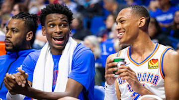 Shai Gilgeous-Alexander #2 and Darius Bazley #7 of OKC Thunder share a conversation during a game vs. Dallas Mavericks on October 8, 2019 at BOK Center. (Photo by Zach Beeker/NBAE via Getty Images)