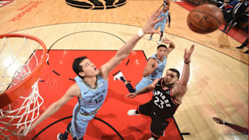 TORONTO, CANADA - JANUARY 19: Fred VanVleet #23 of the Toronto Raptors drives to the basket against Yuta Watanabe #12 of the Memphis Grizzlies on January 19, 2019 at the Scotiabank Arena in Toronto, Ontario, Canada. NOTE TO USER: User expressly acknowledges and agrees that, by downloading and or using this Photograph, user is consenting to the terms and conditions of the Getty Images License Agreement. Mandatory Copyright Notice: Copyright 2019 NBAE (Photo by Ron Turenne/NBAE via Getty Images)