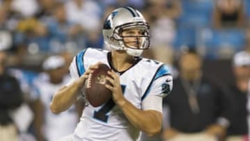 Aug 29, 2013; Charlotte, NC, USA; Carolina Panthers quarterback Jimmy Clausen (7) looks to pass the ball during the third quarter against the Pittsburgh Steelers at Bank of America Stadium. The Panthers defeated the Steelers 25-10. Mandatory Credit: Jeremy Brevard-USA TODAY Sports