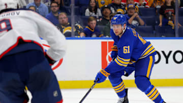 Sep 30, 2023; Buffalo, New York, USA; Buffalo Sabres defenseman Riley Stillman (61) looks to take a shot on goal during the second period against the Columbus Blue Jackets at KeyBank Center. Mandatory Credit: Timothy T. Ludwig-USA TODAY Sports
