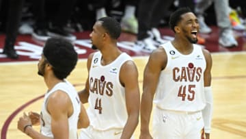 Apr 15, 2023; Cleveland, Ohio, USA; Cleveland Cavaliers guard Donovan Mitchell (45), right, celebrates against the New York Knicks in the fourth quarter of game one of the 2023 NBA playoffs at Rocket Mortgage FieldHouse. Mandatory Credit: David Richard-USA TODAY Sports