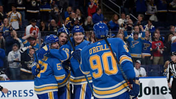 ST. LOUIS, MO - OCTOBER 27: Zach Sanford #12 of the St. Louis Blues is congratulated by teammates after scoring a goal against the Chicago Blackhawks at Enterprise Center on October 27, 2018 in St. Louis, Missouri. (Photo by Joe Puetz/NHLI via Getty Images)