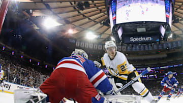NEW YORK, NEW YORK - MAY 11: Brock McGinn #23 of the Pittsburgh Penguins skates against Igor Shesterkin #31 of the New York Rangers in Game Five of the First Round of the 2022 Stanley Cup Playoffs at Madison Square Garden on May 11, 2022 in New York City. (Photo by Bruce Bennett/Getty Images)