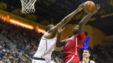 Dec 30, 2016; Berkeley, CA, USA; California Golden Bears center Kingsley Okoroh (22) goes up to block a shot by Arizona Wildcats guard Rawle Alkins (1) during the second half at Haas Pavilion. Arizona defeated California 67-62. Mandatory Credit: Neville E. Guard-USA TODAY Sports