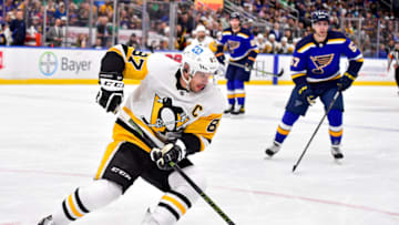 Mar 17, 2022; St. Louis, Missouri, USA; Pittsburgh Penguins center Sidney Crosby (87) controls the puck against the St. Louis Blues during the first period at Enterprise Center. Mandatory Credit: Jeff Curry-USA TODAY Sports