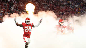 ATLANTA, GA - DECEMBER 28: Brian Asamoah #24 of the Oklahoma Sooners takes the field prior to facing the LSU Tigers at the Chick-fil-A Peach Bowl at Mercedes-Benz Stadium on December 28, 2019 in Atlanta, Georgia. (Photo by Carmen Mandato/Getty Images)