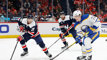 Mar 15, 2023; Washington, District of Columbia, USA; Buffalo Sabres center Tage Thompson (72) skates with the puck as Washington Capitals defenseman Rasmus Sandin (38) defends in overtime at Capital One Arena. Mandatory Credit: Geoff Burke-USA TODAY Sports