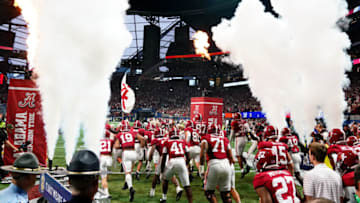 Dec 2, 2023; Atlanta, GA, USA; The Alabama Crimson Tide enter the field before the SEC Championship game against the Georgia Bulldogs at Mercedes-Benz Stadium. Mandatory Credit: John David Mercer-USA TODAY Sports