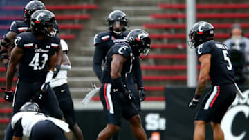 Cincinnati Bearcats linebacker Jarell White celebrates against Army Black Nights at Nippert Stadium. The Enquirer.