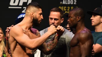 DETROIT, MI - DECEMBER 01: (L-R) Sabah Homasi and Abdul Razak Alhassan of Ghana face off during the UFC 218 weigh-in inside Little Caesars Arena on December 1, 2017 in Detroit, Michigan. (Photo by Josh Hedges/Zuffa LLC/Zuffa LLC via Getty Images)