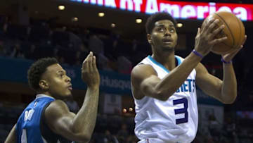 Oct 10, 2016; Charlotte, NC, USA; Charlotte Hornets guard Jeremy Lamb (3) prepares to shoot the ball in front of Minnesota Timberwolves guard Brandon Rush (4) during the second half at Time Warner Cable Arena. The Hornets won 98-86. Mandatory Credit: Joshua S. Kelly-USA TODAY Sports