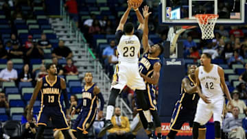 Oct 4, 2016; New Orleans, LA, USA; New Orleans Pelicans forward Anthony Davis (23) shoots over Indiana Pacers forward Thaddeus Young (21) during the first quarter of a game at the Smoothie King Center. Mandatory Credit: Derick E. Hingle-USA TODAY Sports
