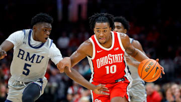 Nov 7, 2022; Columbus, Ohio, USA; Ohio State Buckeyes guard Brice Sensabaugh (10) drives the ball past Robert Morris Colonials guard Enoch Cheeks (5) during the second half at Value City Arena. Mandatory Credit: Joseph Maiorana-USA TODAY Sports