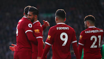 LIVERPOOL, ENGLAND - FEBRUARY 24: Emre Can of Liverpool celebrates scoring his side's first goal with team mates during the Premier League match between Liverpool and West Ham United at Anfield on February 24, 2018 in Liverpool, England. (Photo by Clive Brunskill/Getty Images)