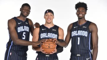 ORLANDO, FL - SEPTEMBER 30: Mo Bamba #5, Aaron Gordon #00, and Jonathan Isaac #1 of the Orlando Magic pose for a portrait during media day on September 30, 2019 at the Amway Center in Orlando, Florida. NOTE TO USER: User expressly acknowledges and agrees that, by downloading and/or using this photograph, user is consenting to the terms and conditions of the Getty Images License Agreement. Mandatory Copyright Notice: Copyright 2019 NBAE (Photo by Fernando Medina/NBAE via Getty Images)