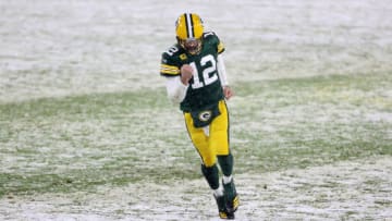 GREEN BAY, WISCONSIN - DECEMBER 27: Quarterback Aaron Rodgers #12 of the Green Bay Packers celebrates a touchdown pass to Equanimeous St. Brown #19 against the Tennessee Titans during the second quarter at Lambeau Field on December 27, 2020 in Green Bay, Wisconsin. (Photo by Dylan Buell/Getty Images)