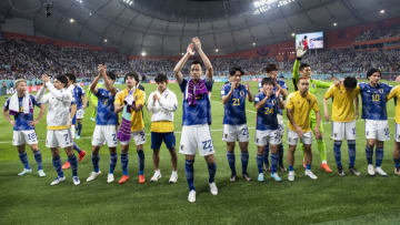 DOHA, QATAR - DECEMBER 01: Japan players celebrate winning the group as they applaud their fans at the end of the FIFA World Cup Qatar 2022 Group E match between Japan and Spain at Khalifa International Stadium on December 1, 2022 in Doha, Qatar. (Photo by Sebastian Frej/MB Media)