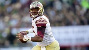 January 1, 2015; Pasadena, CA, USA; Florida State Seminoles quarterback Jameis Winston (5) runs the ball against the Oregon Ducks in the 2015 Rose Bowl college football game at Rose Bowl. Mandatory Credit: Gary A. Vasquez-USA TODAY Sports