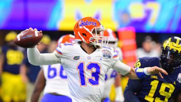 ATLANTA, GEORGIA - DECEMBER 29: Feleipe Franks #13 of the Florida Gators looks to pass against the Michigan Wolverines in the first quarter during the Chick-fil-A Peach Bowl at Mercedes-Benz Stadium on December 29, 2018 in Atlanta, Georgia. (Photo by Scott Cunningham/Getty Images)