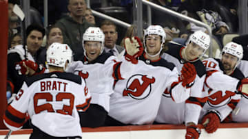 Oct 30, 2021; Pittsburgh, Pennsylvania, USA; New Jersey Devils left wing Jesper Bratt (63) celebrates with the Devils bench after scoring on a penalty shot against the Pittsburgh Penguins during the third period at PPG Paints Arena. The Devils won 4-2. Mandatory Credit: Charles LeClaire-USA TODAY Sports