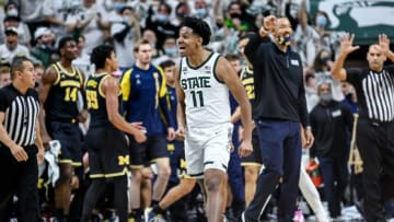 Michigan State's A.J. Hoggard celebrates after a play against Michigan during the second half on Saturday, Jan. 29, 2022, at the Breslin Center in East Lansing.220129 Msu Mich 222a