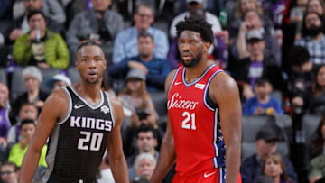 SACRAMENTO, CA - FEBRUARY 2: Harry Giles #20 of the Sacramento Kings faces off against Joel Embiid #21 of the Philadelphia 76ers on February 2, 2019 at Golden 1 Center in Sacramento, California. NOTE TO USER: User expressly acknowledges and agrees that, by downloading and or using this photograph, User is consenting to the terms and conditions of the Getty Images Agreement. Mandatory Copyright Notice: Copyright 2019 NBAE (Photo by Rocky Widner/NBAE via Getty Images)