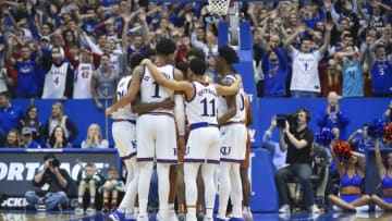 LAWRENCE, KANSAS - JANUARY 14: Members of the Kansas Jayhawks huddle against the Texas Longhorns at Allen Fieldhouse on January 14, 2019 in Lawrence, Kansas. (Photo by Ed Zurga/Getty Images)
