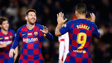 Lionel Messi of FC Barcelona celebrates with Luis Suarez of FC Barcelona. (Photo by Eric Alonso/MB Media/Getty Images)
