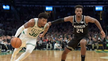 Nov 25, 2019; Boston, MA, USA; Boston Celtics guard Marcus Smart (36) drives to the basket while Sacramento Kings guard Buddy Hield (24) during the second half at TD Garden. Mandatory Credit: Bob DeChiara-USA TODAY Sports