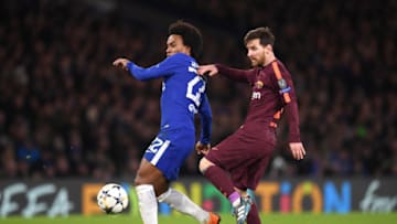 LONDON, ENGLAND - FEBRUARY 20: Willian of Chelsea is challenged by Lionel Messi of Barcelona during the UEFA Champions League Round of 16 First Leg match between Chelsea FC and FC Barcelona at Stamford Bridge on February 20, 2018 in London, United Kingdom. (Photo by Mike Hewitt/Getty Images)