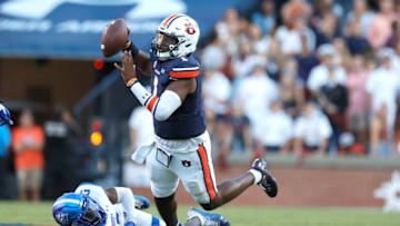 Auburn footballSep 25, 2021; Auburn, Alabama, USA; Georgia State Panthers linebacker Shamar McCollum (17) knocks Auburn Tigers quarterback TJ Finley (1) off balance during the fourth quarter at Jordan-Hare Stadium. Finley completed the pass to keep the go ahead drive alive. Mandatory Credit: John Reed-USA TODAY Sports