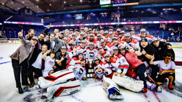 ROSEMONT, IL - JUNE 08: The Charlotte Checkers celebrate and pose for a photo after game five of the AHL Calder Cup Finals against the Chicago Wolves on June 8, 2019, at the Allstate Arena in Rosemont, IL. (Photo by Patrick Gorski/Icon Sportswire via Getty Images)
